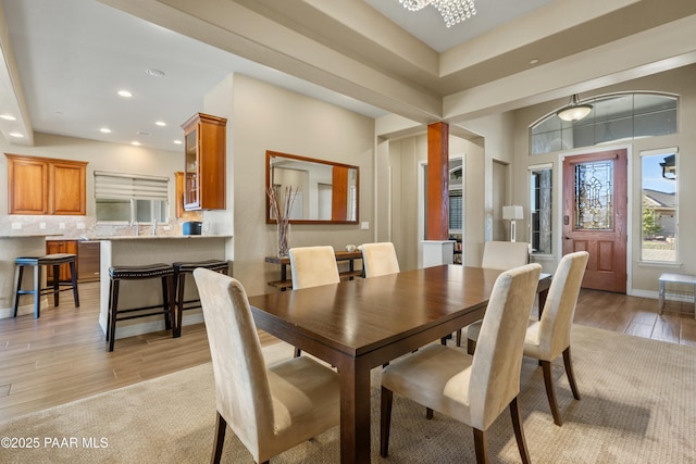 dining area featuring a chandelier