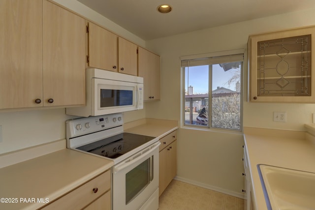 3160 Cascades Dr Unit 16H, Prescott, AZ 86301 - kitchen featuring white appliances, light brown cabinets, light countertops, recessed lighting, and light floors