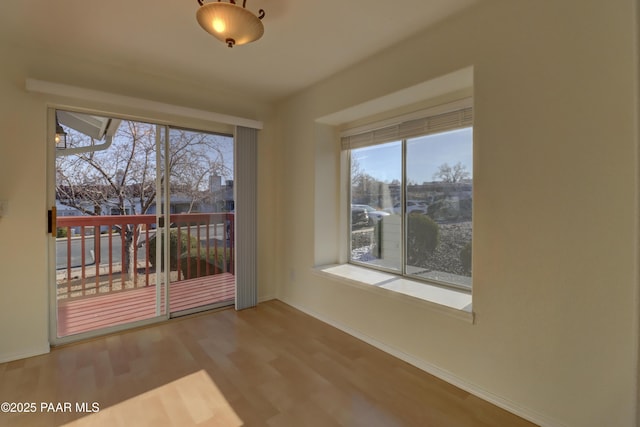 3160 Cascades Dr Unit 16H, Prescott, AZ 86301 - unfurnished room featuring wood finished floors and plenty of natural light