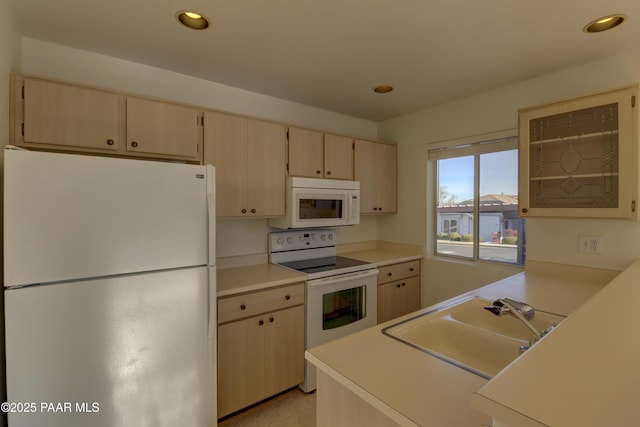 3160 Cascades Dr Unit 16H, Prescott, AZ 86301 - kitchen with white appliances, light countertops, recessed lighting, and light brown cabinets