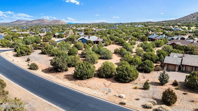 birds eye view of property with a residential view and a mountain view