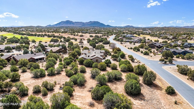 drone / aerial view with a residential view and a mountain view