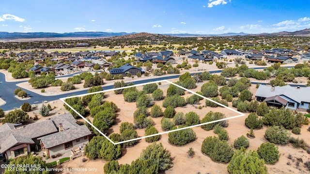 birds eye view of property featuring a residential view and a mountain view