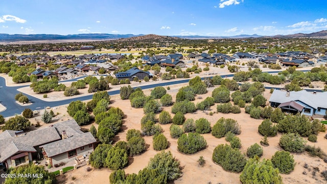 bird's eye view with a residential view and a mountain view