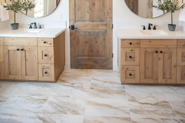 12355 Cooper Morgan Trl, Prescott, AZ 86305 - bathroom featuring marble look tile flooring and two vanities