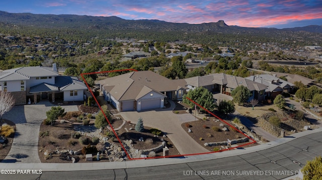 904 Daybreak Dr, Prescott, AZ 86303 - aerial view at dusk of a residential view, a mountain view, and property parcel outlined
