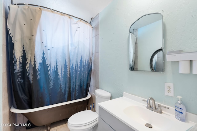 full bathroom with tile patterned floors, vanity, toilet, and shower / bath combo