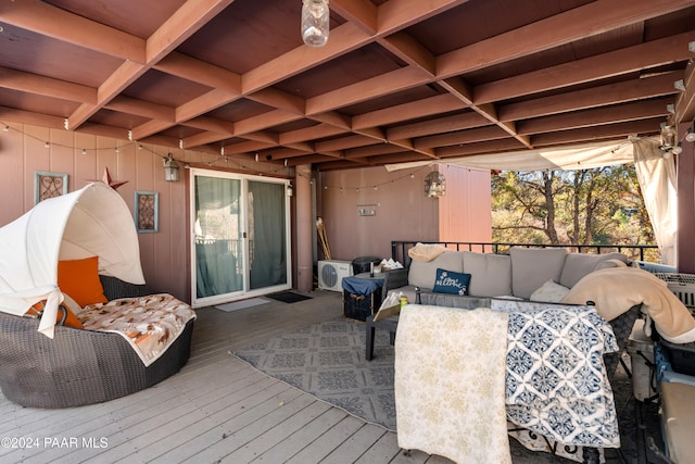 wooden deck featuring an outdoor hangout area