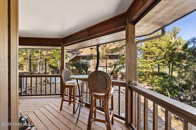 sunroom / solarium featuring a healthy amount of sunlight