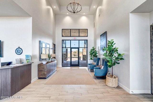 reception area with a notable chandelier