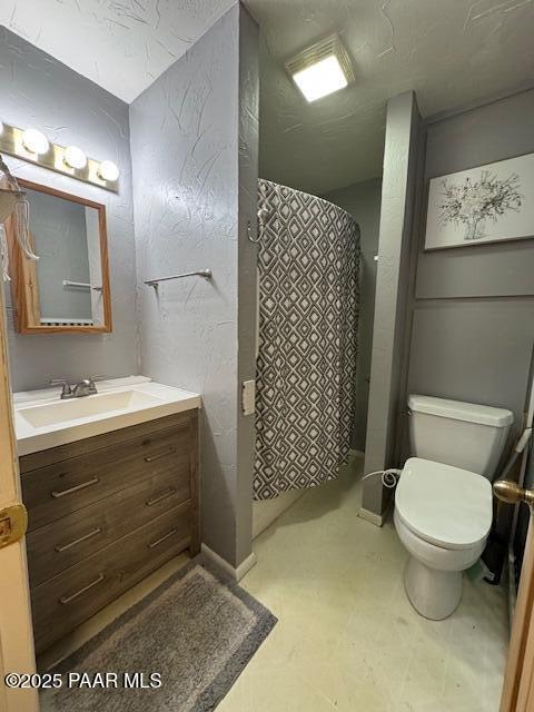 1696 W Linger Ln, Prescott, AZ 86303 - full bath featuring vanity, tile patterned floors, and a shower with shower curtain
