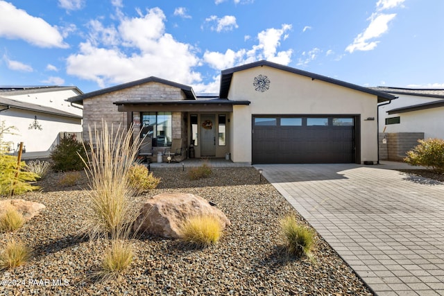 view of front of home with a garage