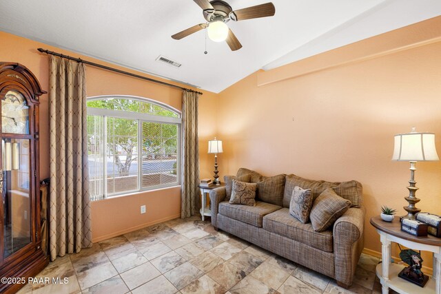 7785 E Bramble Berry Ln, Prescott Valley, AZ 86315 - living room with lofted ceiling, baseboards, and a ceiling fan