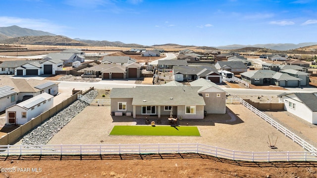 birds eye view of property featuring a residential view and a mountain view