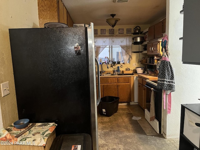 kitchen with white appliances and sink