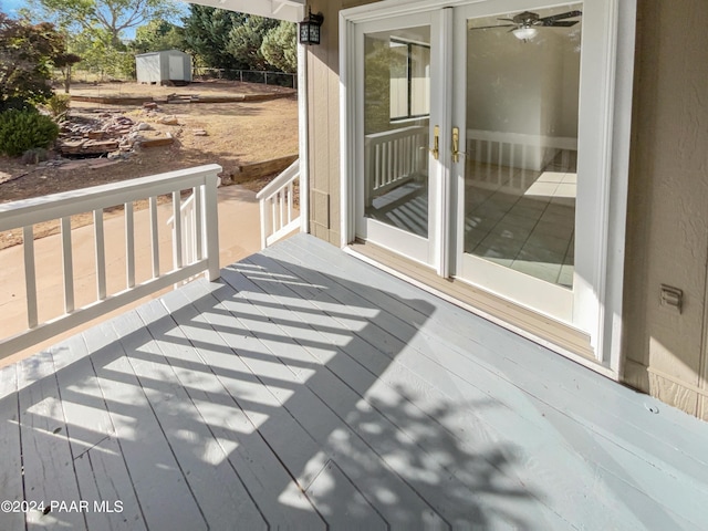 deck featuring a storage shed