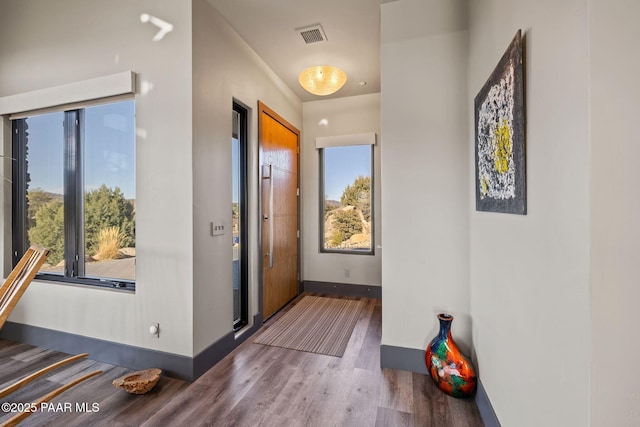 interior space with dark wood-type flooring