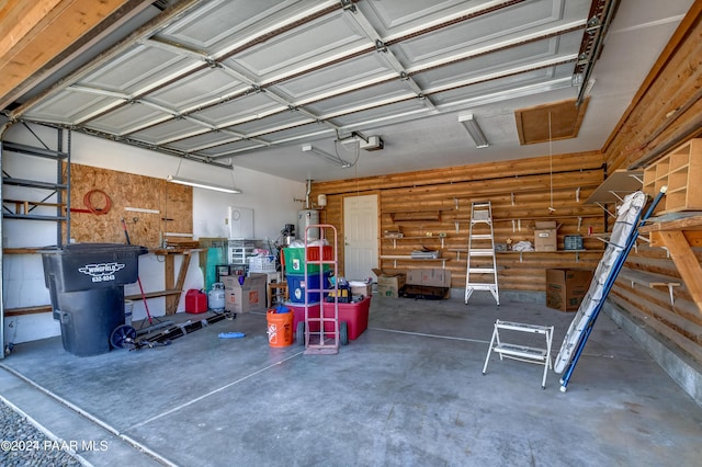 2570 S Colina Ln, Dewey-Humboldt, AZ 86329 - garage with water heater and a garage door opener