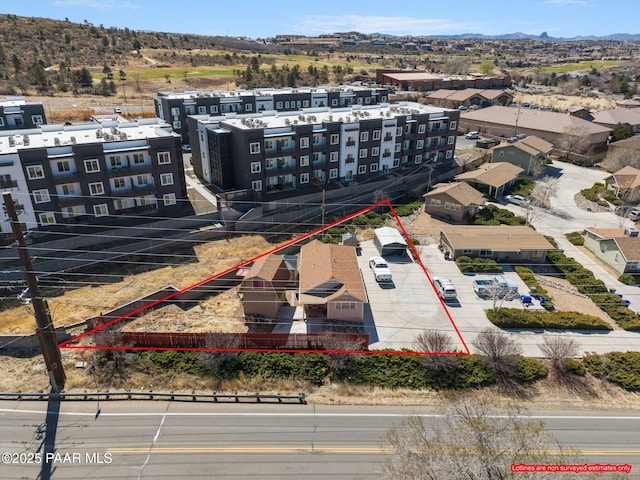 bird's eye view with a mountain view