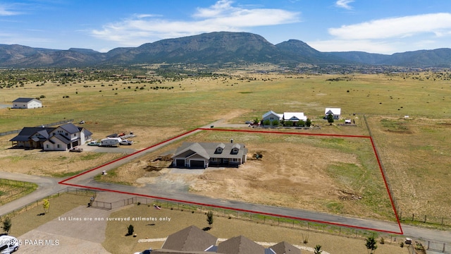 aerial view with a mountain view and a rural view