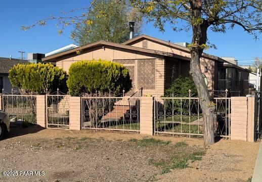 327 N Arizona Ave, Prescott, AZ 86301 - view of front of property featuring a gate and a fenced front yard