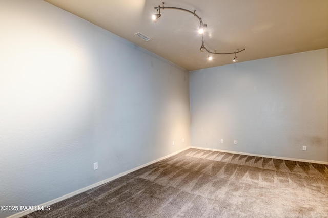 1017 N Fairway Dr, Dewey-Humboldt, AZ 86327 - carpeted empty room with baseboards and track lighting
