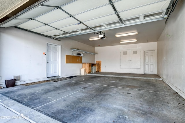 1017 N Fairway Dr, Dewey-Humboldt, AZ 86327 - garage featuring a garage door opener