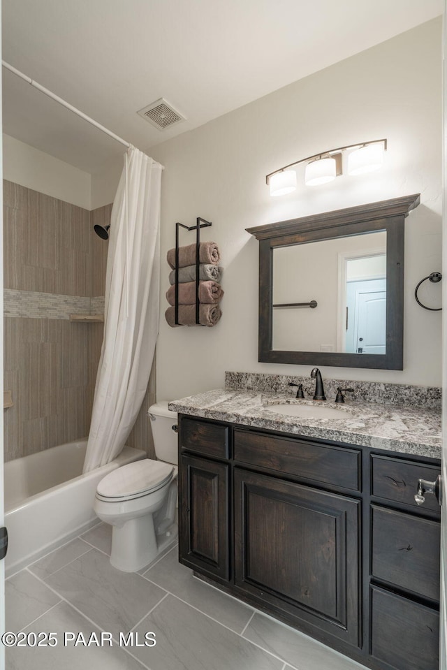 10550 E Cumberland Ct, Dewey-Humboldt, AZ 86327 - bathroom featuring toilet, visible vents, shower / bathtub combination with curtain, and vanity