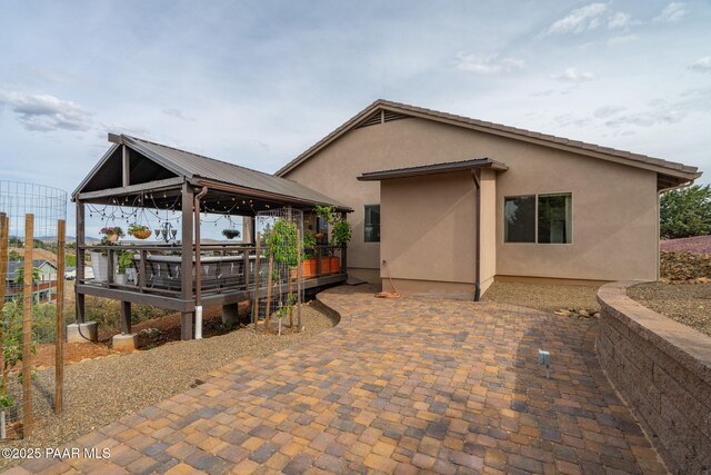 10550 E Cumberland Ct, Dewey-Humboldt, AZ 86327 - back of house featuring a patio, a gazebo, and stucco siding
