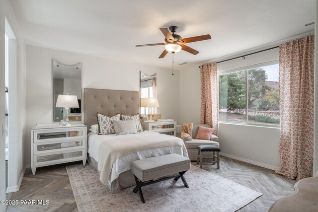 10550 E Cumberland Ct, Dewey-Humboldt, AZ 86327 - bedroom with a ceiling fan, baseboards, and visible vents