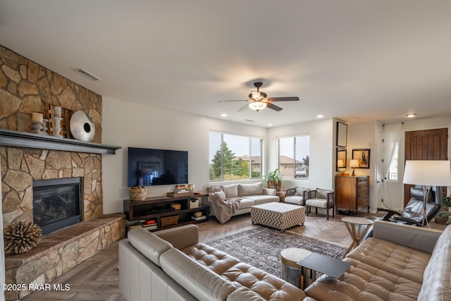 10550 E Cumberland Ct, Dewey-Humboldt, AZ 86327 - living area featuring a ceiling fan, visible vents, recessed lighting, and a fireplace
