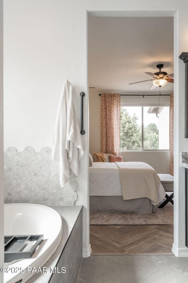 10550 E Cumberland Ct, Dewey-Humboldt, AZ 86327 - full bathroom with ceiling fan, a tub to relax in, and connected bathroom