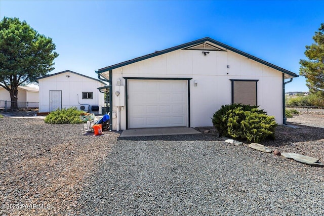 20249 E Prickly Pear Dr, Mayer, AZ 86333 - garage with gravel driveway