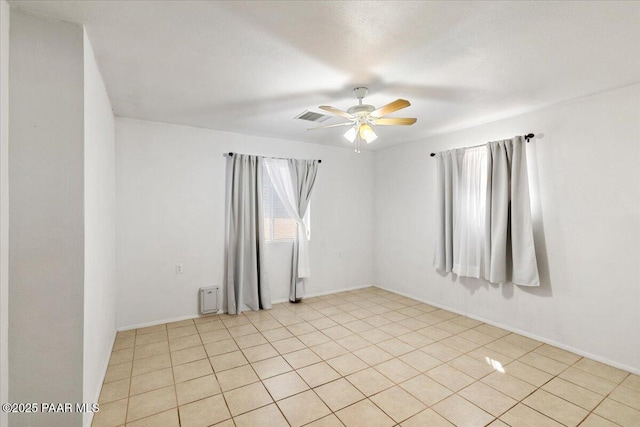 20249 E Prickly Pear Dr, Mayer, AZ 86333 - empty room featuring a ceiling fan and light tile patterned floors