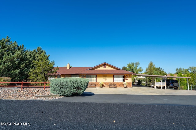 view of front of house with a carport