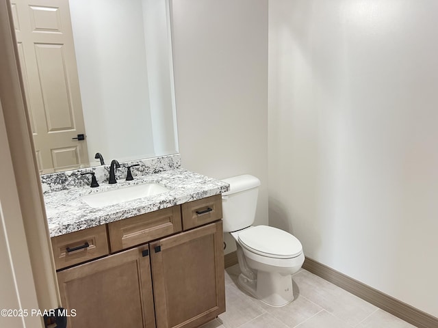 218 Brenna Dr, Chino Valley, AZ 86323 - bathroom with baseboards, vanity, toilet, and tile patterned flooring
