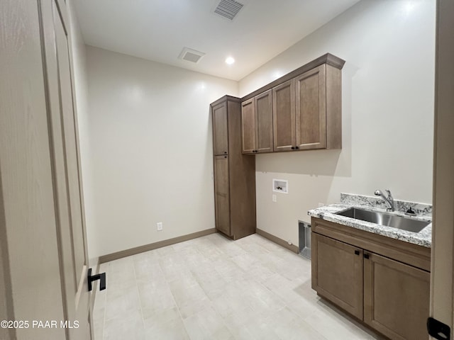218 Brenna Dr, Chino Valley, AZ 86323 - washroom featuring washer hookup, cabinet space, baseboards, and recessed lighting
