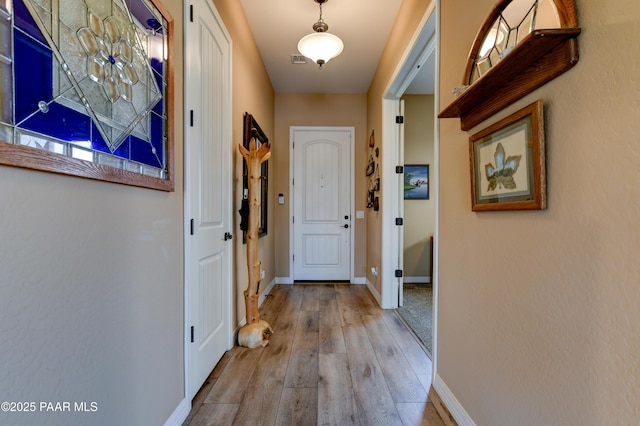 6166 E Walden Way, Prescott Valley, AZ 86314 - hallway with wood finished floors and baseboards