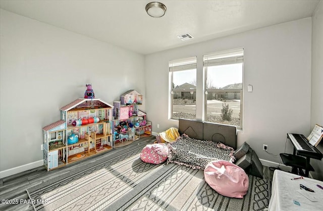 1680 Bainbridge Ln, Chino Valley, AZ 86323 - game room with baseboards and wood finished floors