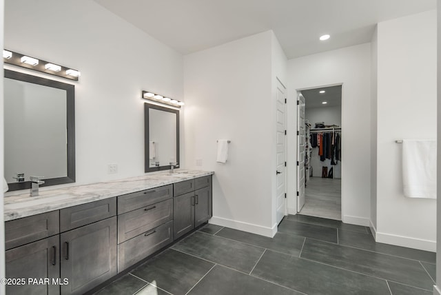 bathroom featuring vanity and tile patterned flooring