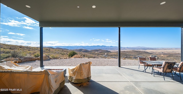 view of patio with a mountain view