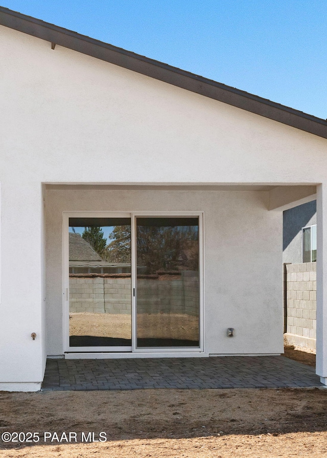 7492 E Louie Ln, Prescott Valley, AZ 86315 - back of house featuring stucco siding and fence