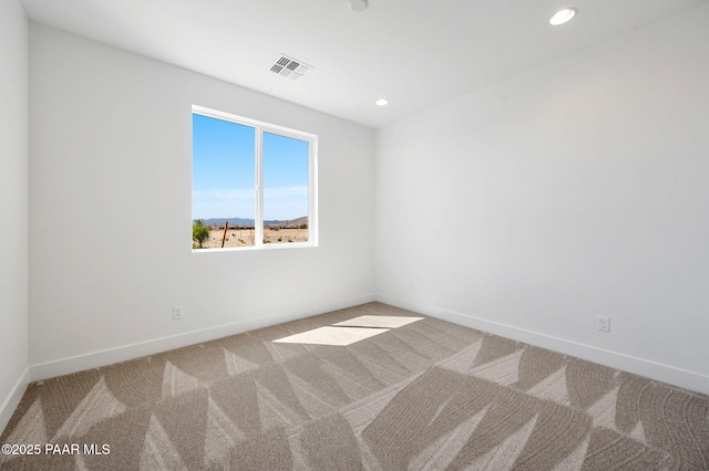 7492 E Louie Ln, Prescott Valley, AZ 86315 - carpeted spare room with baseboards, visible vents, and recessed lighting