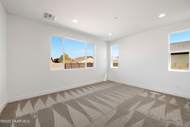 7492 E Louie Ln, Prescott Valley, AZ 86315 - carpeted empty room with visible vents, baseboards, recessed lighting, and a healthy amount of sunlight