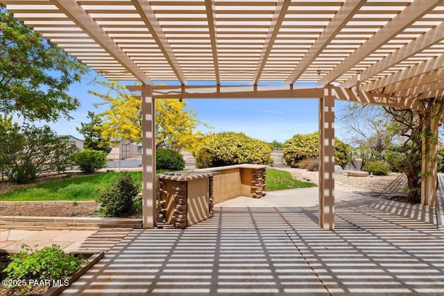 1640 W Grasshopper Ln, Chino Valley, AZ 86323 - view of patio featuring a pergola and fence