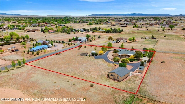1640 W Grasshopper Ln, Chino Valley, AZ 86323 - overview of rural landscape with property boundaries highlighted and a mountain backdrop