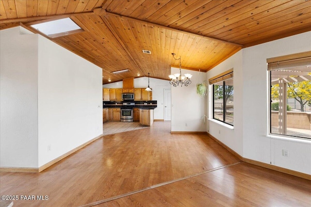 1640 W Grasshopper Ln, Chino Valley, AZ 86323 - unfurnished dining area featuring vaulted ceiling, a chandelier, light wood-style floors, wood ceiling, and baseboards