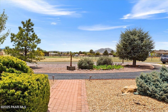 1640 W Grasshopper Ln, Chino Valley, AZ 86323 - view of yard with fence and a mountain view