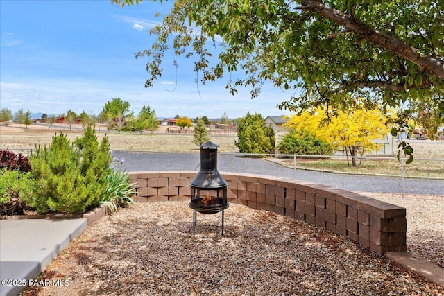 1640 W Grasshopper Ln, Chino Valley, AZ 86323 - fenced yard with an outdoor fire pit