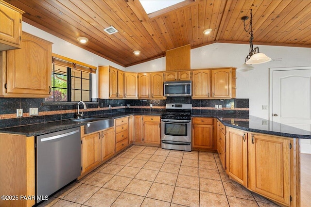 1640 W Grasshopper Ln, Chino Valley, AZ 86323 - kitchen featuring appliances with stainless steel finishes, a sink, a peninsula, lofted ceiling, and wooden ceiling
